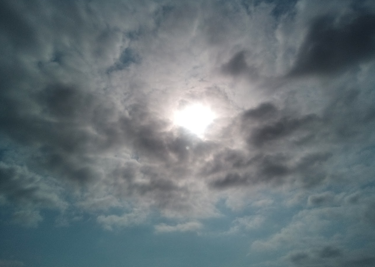 sun breaking through clouds