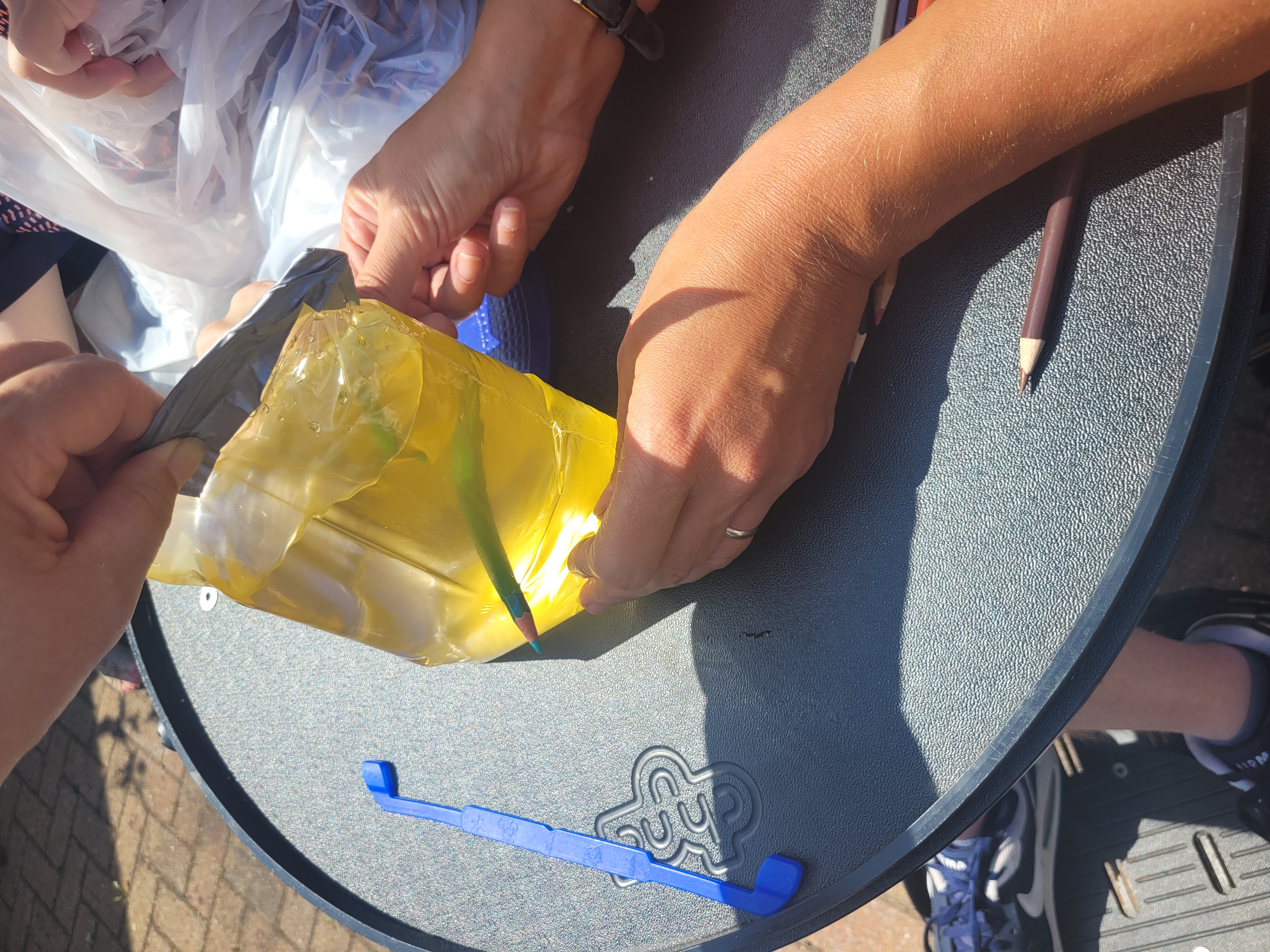 pencil through bag
